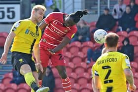 Joe Dodoo heads home against Burton Albion.