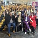 Councillor Farmer, Mayor of Doncaster Ros Jones, senior leaders and staff celebrate.