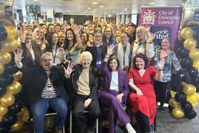 Councillor Farmer, Mayor of Doncaster Ros Jones, senior leaders and staff celebrate.