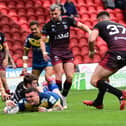 Robbie Storey scores for the Dons. Picture: Howard Roe/AHPIX.com