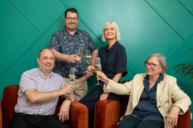 Toasting the changes at Royston Parkin (left to right) Andy Froggatt, Phil Emery, Emily Kirk and Lynn Pridmore.