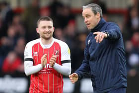 Cheltenham Town's Alfie May celebrates victory with manager Michael Duff. Picture: Gareth Williams/AHPIX LTD