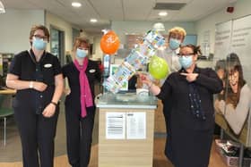 Specsavers team at Armthorpe celebrate four years service