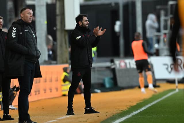 Doncaster Rovers boss Danny Schofield on the touchline at Newport County.