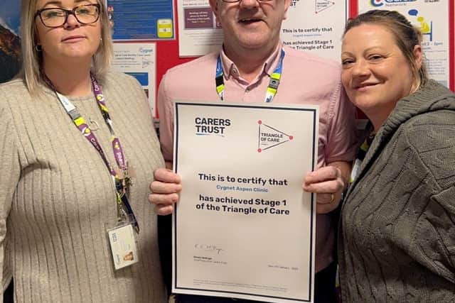 Hospital Manager Neil Booth celebrates the Triangle of Care accreditation