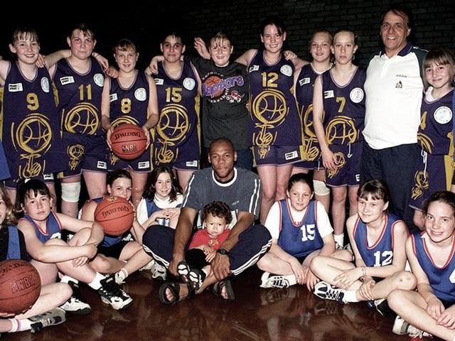 Pictured are members of two Doncaster girls basketball teams, The Panthers and Doncaster, along with former Sheffield Sharks player Garnet Gayle (centre) who came along to the Adwick Sports Centre to lend his support for a Girls U13 North of England Basketball Tournament in May 1997