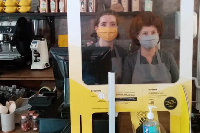 Hannah and Carol Shekle, of Dreambakes cafe on Priory Walk, with protective equipment. They are among cafes restaurants and bars that are re-opening. Picture: Hannah Shekle