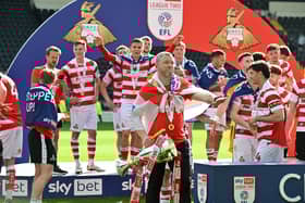 A 2-1 win at Notts County saw Rovers crowned League Two champions, sparking these scenes of jubilant celebrations.
