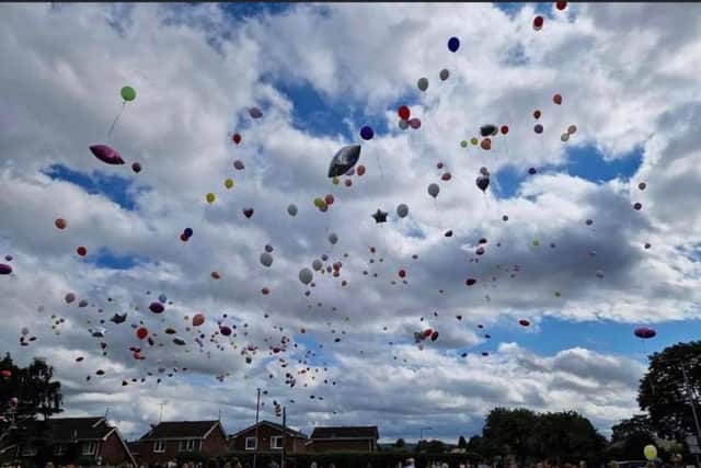 Hundreds of balloons in all colours were released into the sky to mark the life of Keita Mullen.
