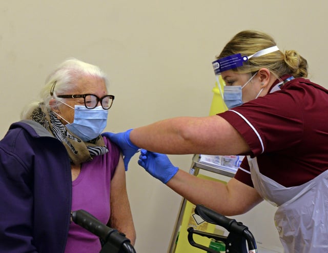 Ann Duggan, is the first to recieve the Covid-19 Vaccination in Doncaster. Picture: NDFP-15-12-20-CovidVaccine 4-NMSY