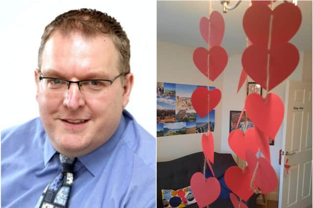 Darren Burke has been working from home surrounded by Valentine's Day decorations.