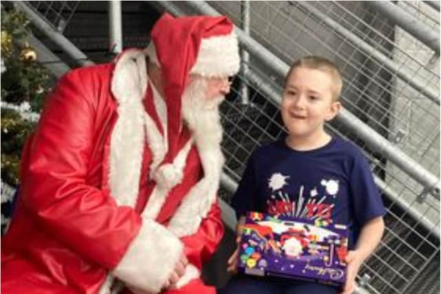 Zak comes face to face with Father Christmas at Go Bounce.