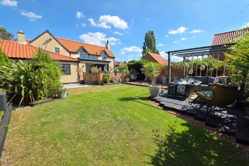 Looking towards the rear of the octtage from its south-facing gardens.