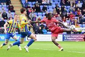 Mipo Odubeko tries his luck on goal against Shrewsbury Town. Picture: Howard Roe/AHPIX LTD