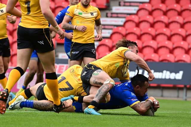 Mahe Fonua scores for the Dons. Picture: Howard Roe/AHPIX.com