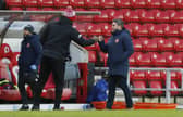 Darren Moore with Sunderland boss Lee Johnson. Picture: Craig Brough/AHPIX