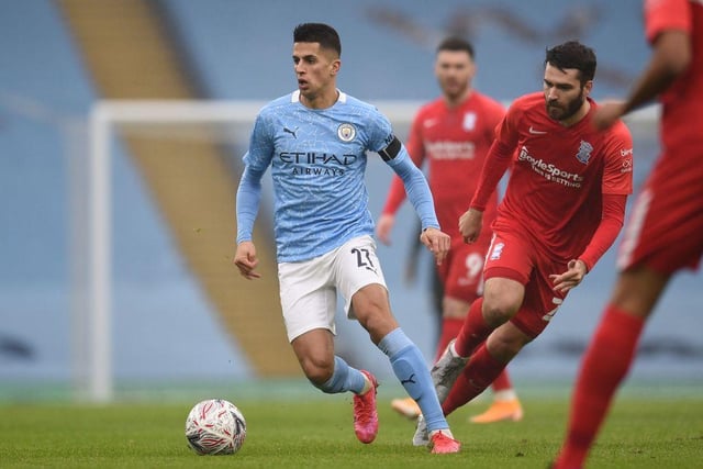 Cancelo has been inspired form of late, and is likely to start at right-back. (Photo by OLI SCARFF/AFP via Getty Images)