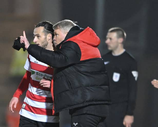 Grant McCann dishes out instructions to Jamie Sterry in the draw at Colchester.