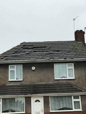 Roof tiles were blown off during the storm on Welfare Road Woodlands. picture by Ryan Jacques