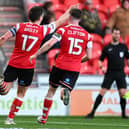 Owen Bailey celebrates Rovers' opener.