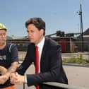 Ed Miliband MP chats with Dennis Crew during his visit to Hatfield Colliery near Doncaster on the day it was announced it is to close.Picture Scott Merrylees