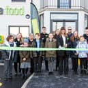 Children from Shaw Wood Academy join Store manager Lyn Hunter and her team, as well as Councilor Tim Needham from Doncaster Council to cut the ribbon