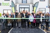 Children from Shaw Wood Academy join Store manager Lyn Hunter and her team, as well as Councilor Tim Needham from Doncaster Council to cut the ribbon