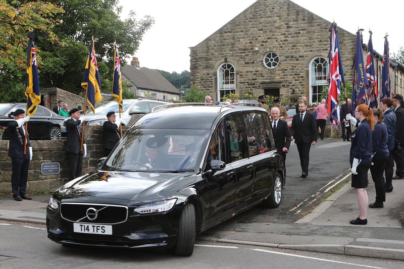 Standard bearers line the exit to Town End Methodist Church to pay their respects