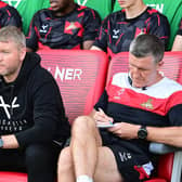 Doncaster manager Grant McCann (centre), his assistant Cliff Byrne (right) and goalkeeper coach Kyle Letheren.