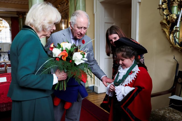 King Charles III and Camilla, Queen Consort meet Doncaster junior civic mayor Amelia Beckingham during their visit to the Mansion House in Doncaster during an official visit to Yorkshire on November 9, 2022.  (Photo by Molly Darlington - WPA Pool/Getty Images)