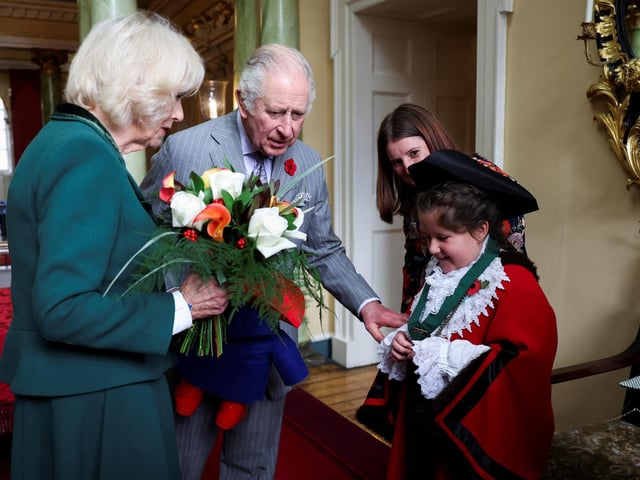 King Charles III and Camilla, Queen Consort meet Doncaster junior civic mayor Amelia Beckingham during their visit to the Mansion House in Doncaster during an official visit to Yorkshire on November 9, 2022. (Photo by Molly Darlington - WPA Pool/Getty Images)