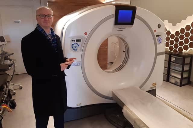 Dr Jason Page with the scanner which will be operating in car parks in Doncaster under the  Doncaster Lung Health Check programme