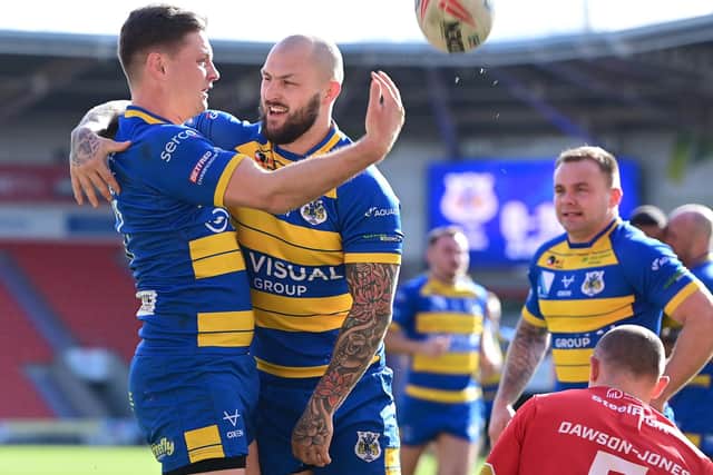 Dons' Josh Guzdek celebrates his try against Sheffield with Luke Briscoe. Picture: Andrew Roe/AHPIX LTD