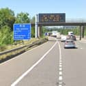 Emergency services are at the scene on the M18.