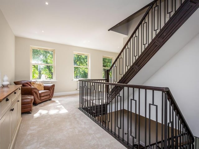 The first floor landing with bespoke staircase to the second floor.
