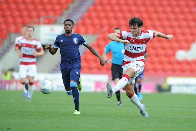 John Marquis in action for Doncaster Rovers.