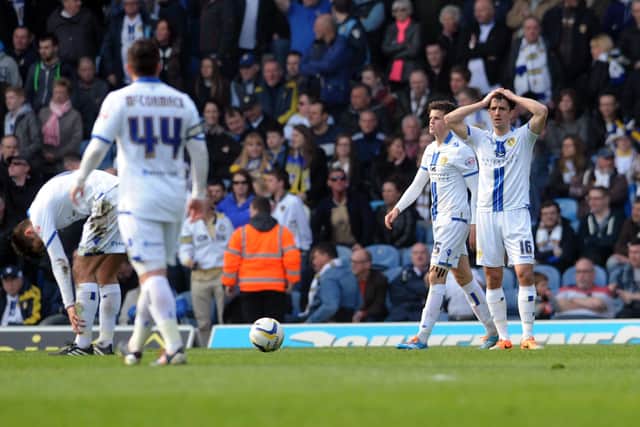 Leeds players react after Rovers' second goal.