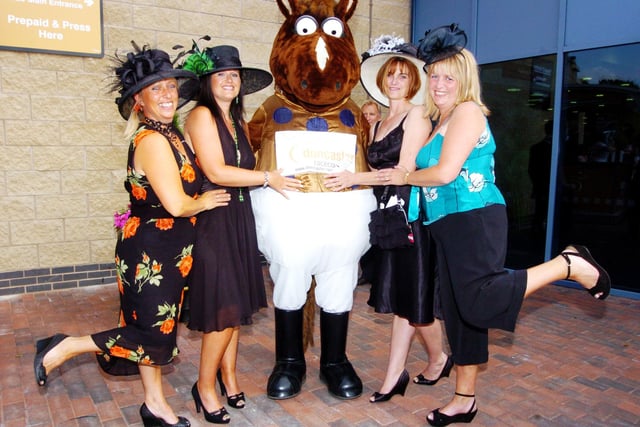 Enjoying Ladies Day at the St Leger Festival are L-R Debbie O'Toole, of Owston Ferry, Karen Readshaw, of West Stockwith, Jo Mann, and Elaine Cooper, both of Westwoodside (Picture: Liz Robinson D1830LR)