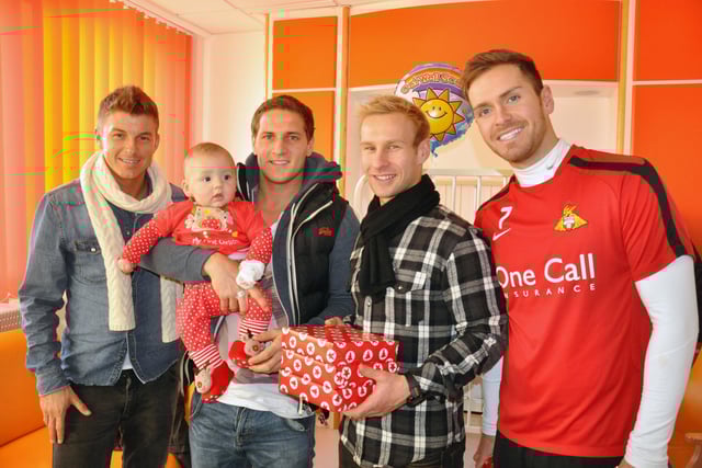 John Oster, Billy Sharp, Simon Gillett and Martin Woods pictured during their visit to the children's ward at Doncaster Royal Infirmary during Christmas 2011.