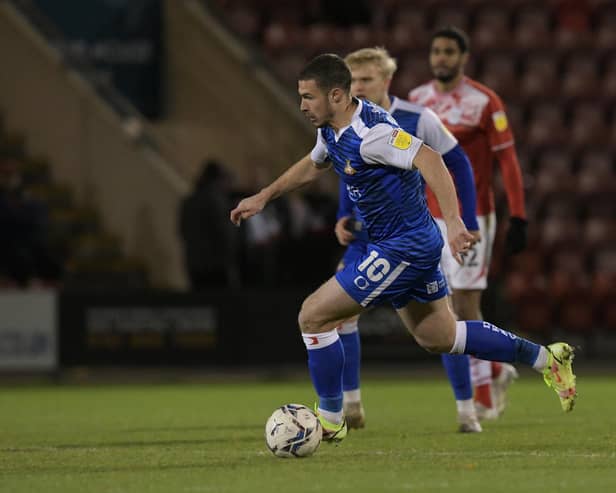 Doncaster's Tommy Rowe drives forward against Crewe Alexandra in the Papa John's Trophy last season.