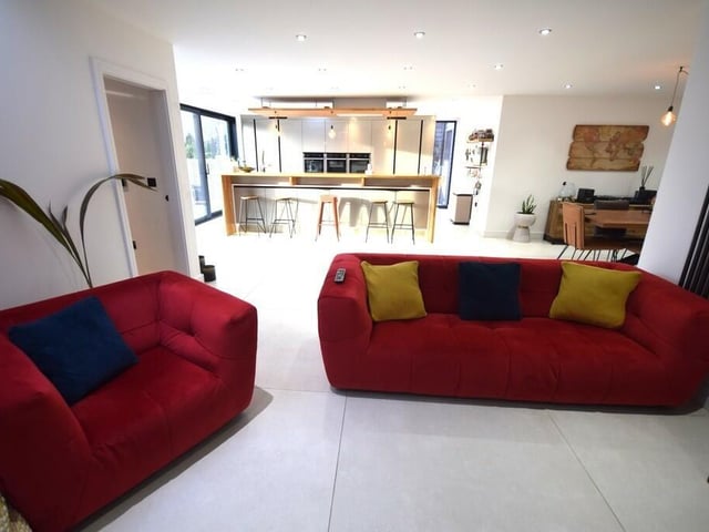 Open plan soft seating space for family and friends.