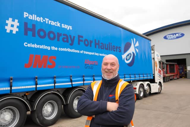 Neil Woodcock, a driver with JMS Transport, with his #Hooray for Hauliers trailer