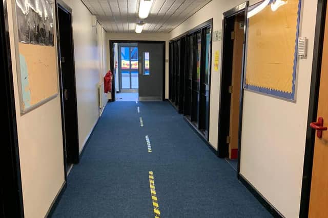 One of the corridors at Astrea Woodlands Academy marked out for distancing