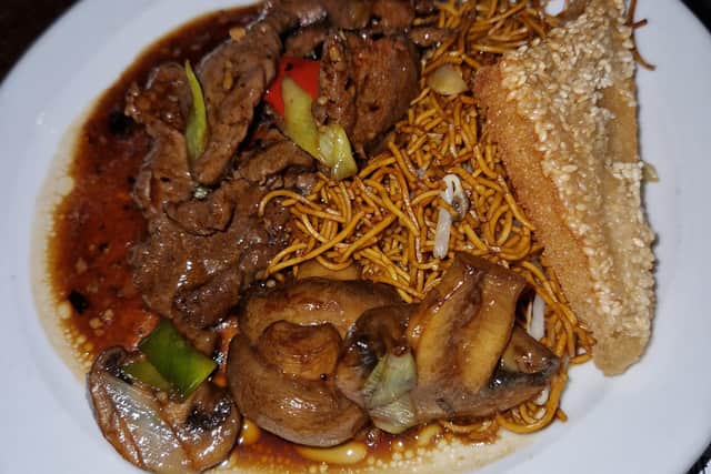 Beef in black bean sauce and mushrooms in oyster sauce - delicious.