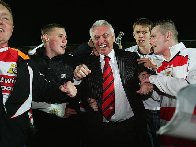 John Ryan is mobbed by Rovers fans following the play-off win over Southend United in 2008. Photo: Matthew Lewis/Getty Images