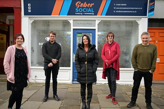 L-r Sally Hickson-Clark, Adult Services Manager, Jon Gooch, Digital Communications Offier, Chrissy Elmore, Pathways Worker, Raquel Anne, Digital Support Worker/Group Support Worker and David Binns, Finance and Admin Team Leader, pictured outside Sober Social.