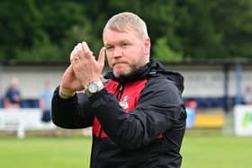 Grant McCann applauds the Rovers fans after the win over Rossington. Picture: Howard Roe/AHPIX LTD