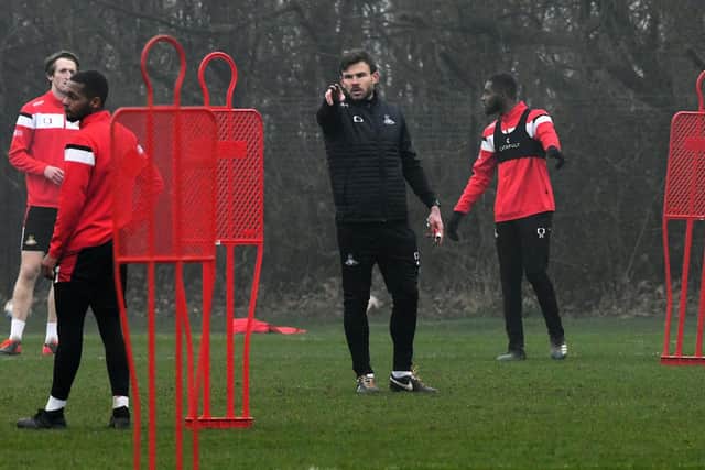 Andy Butler takes his players in training after assuming charge of Rovers