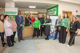 Representatives from Doncaster and Bassetlaw Teaching Hospitals (DBTH), Rotherham, Doncaster, and South Humber NHS Foundation Trust (RDaSH), and Macmillan Cancer Support with Julia and Bob (centre), local Macmillan supporters.