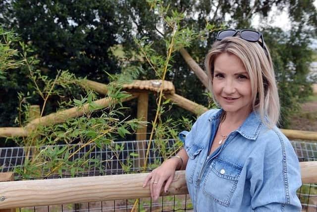 The television presenter helped feed rare red pandas at the Doncaster zoo.